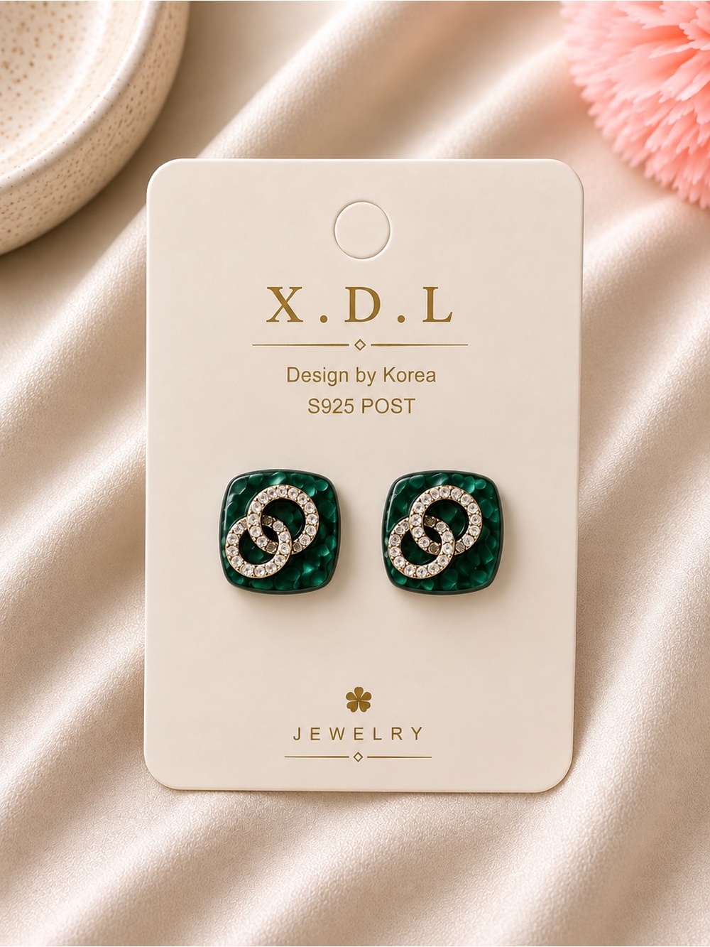 Green Crystal Interlock Stud Earrings
